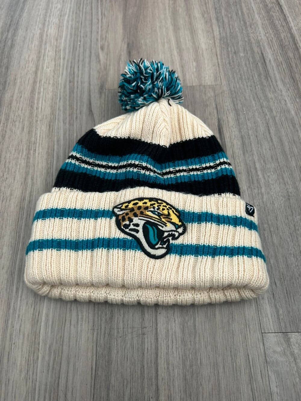 Jacksonville Jaguars Cream Striped Pom Beanie One Size